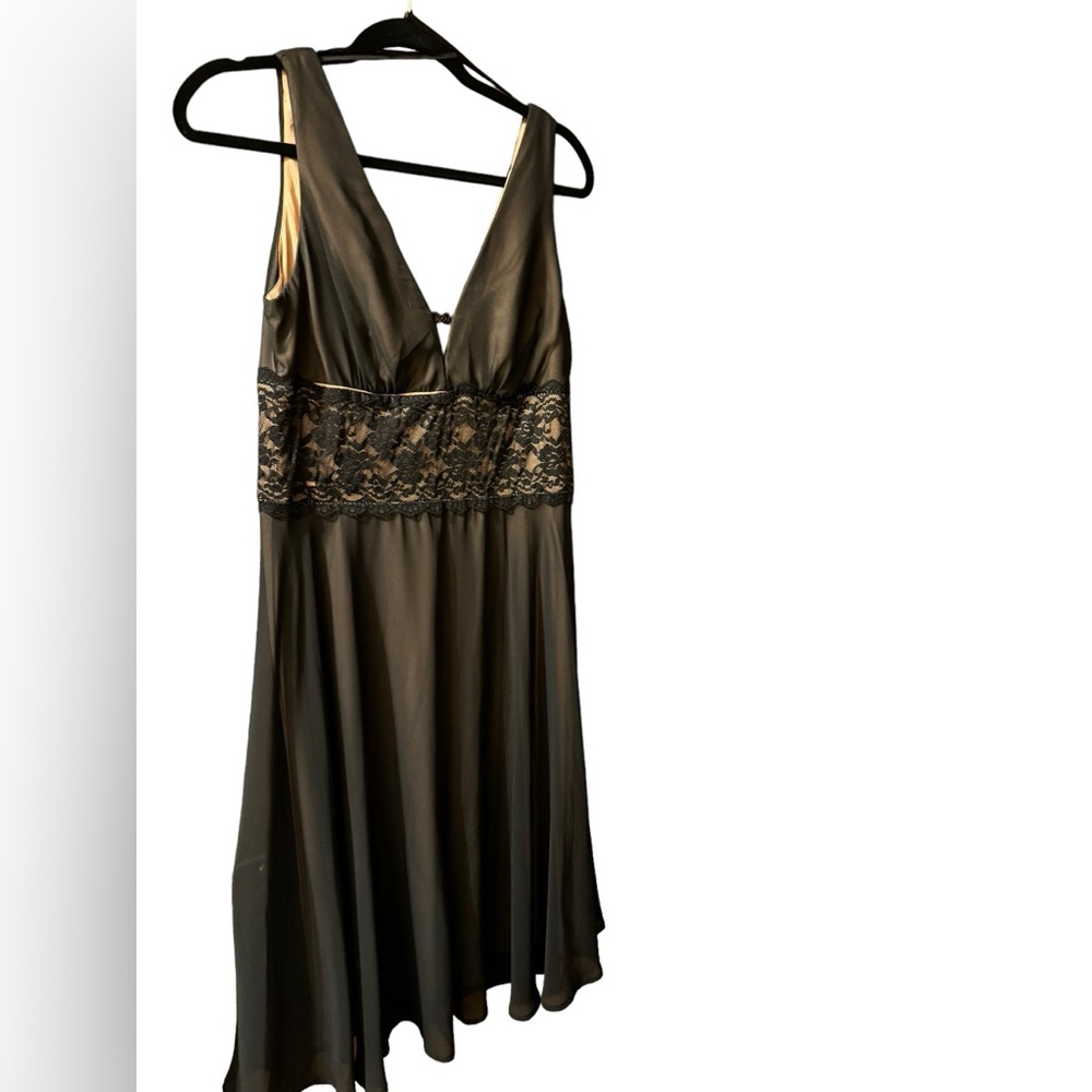 Black dress with tan undertone and lace band and V neck and sleeveless Size 12